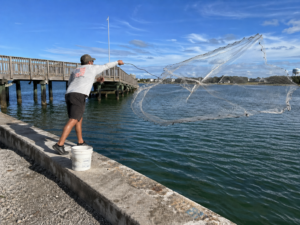 hopa man throwing castnet